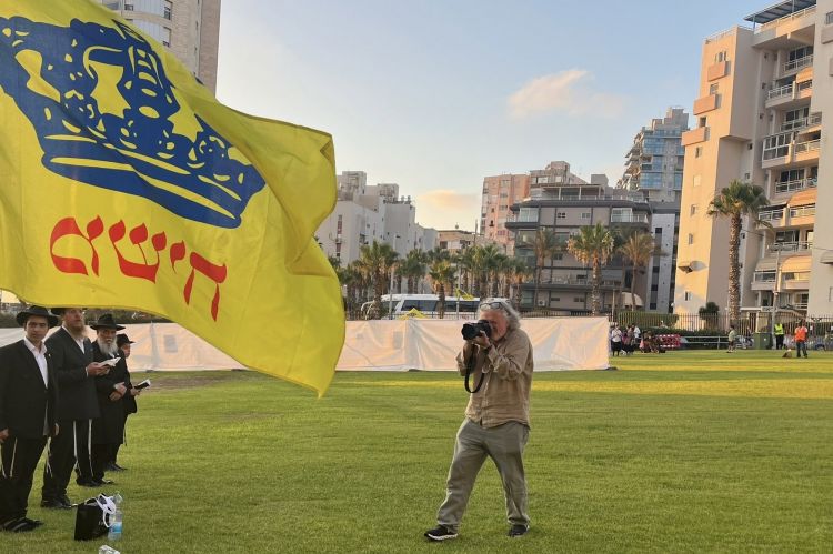 הצלם הבינלאומי מתעד בעצרת
